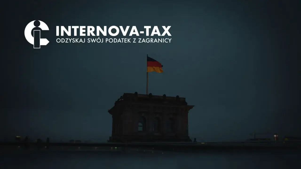 Internova-Tax: odzyskaj swój podatek z zagranicy. Niemiecki Reichstag z flagą, symbolizujący zwrot podatku macierzyńskiego w Niemczech.