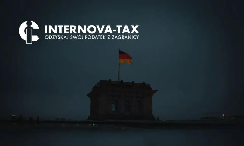 Internova-Tax: odzyskaj swój podatek z zagranicy. Niemiecki Reichstag z flagą, symbolizujący zwrot podatku macierzyńskiego w Niemczech.